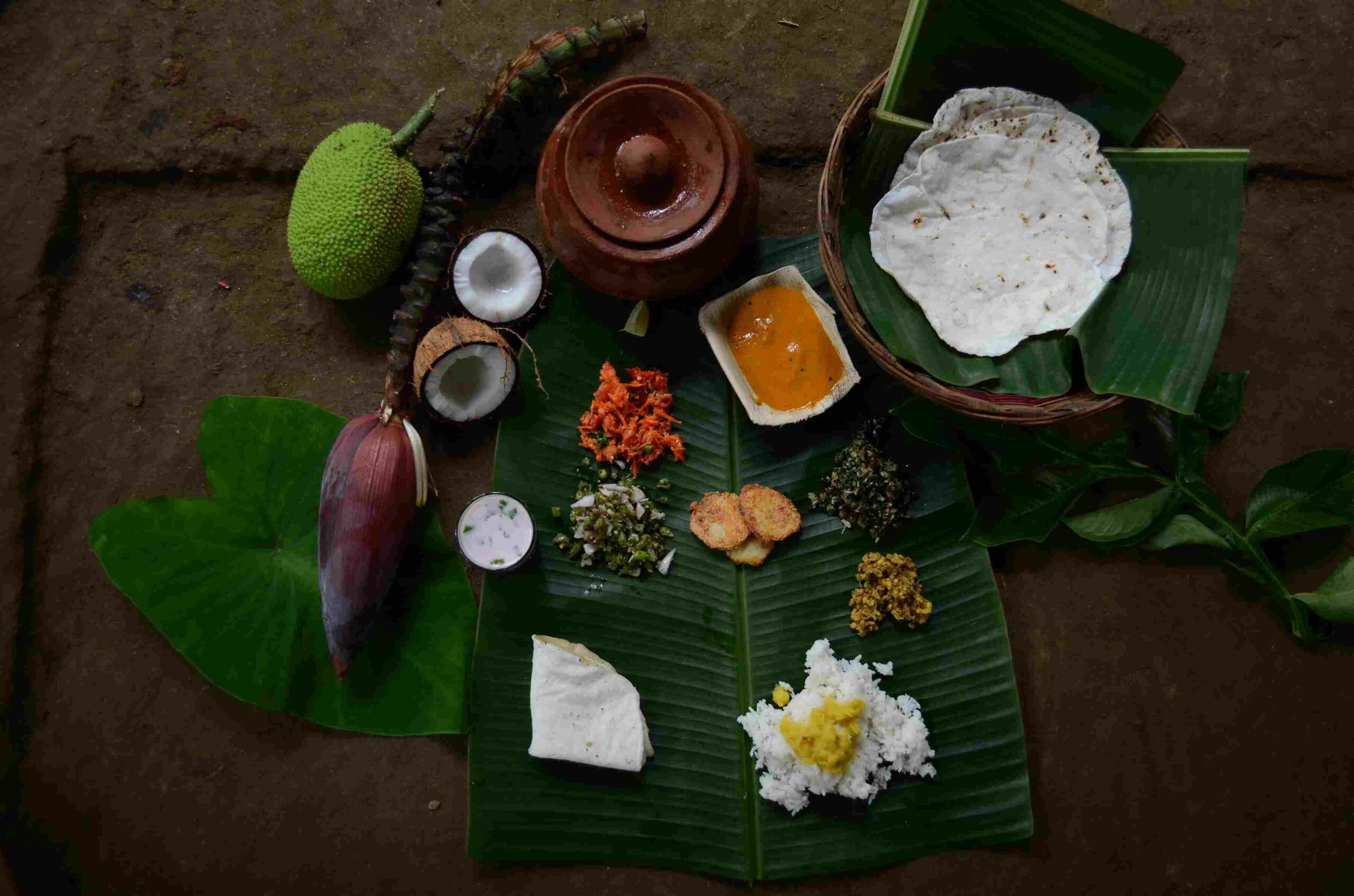 A traditional Konkan feast is prepared for guests by the local women at the farmstay