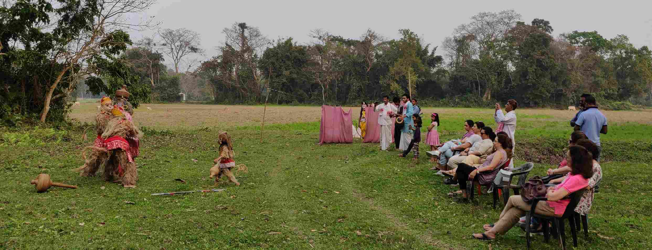 Guests watching a performance at Majuli, a town in Assam