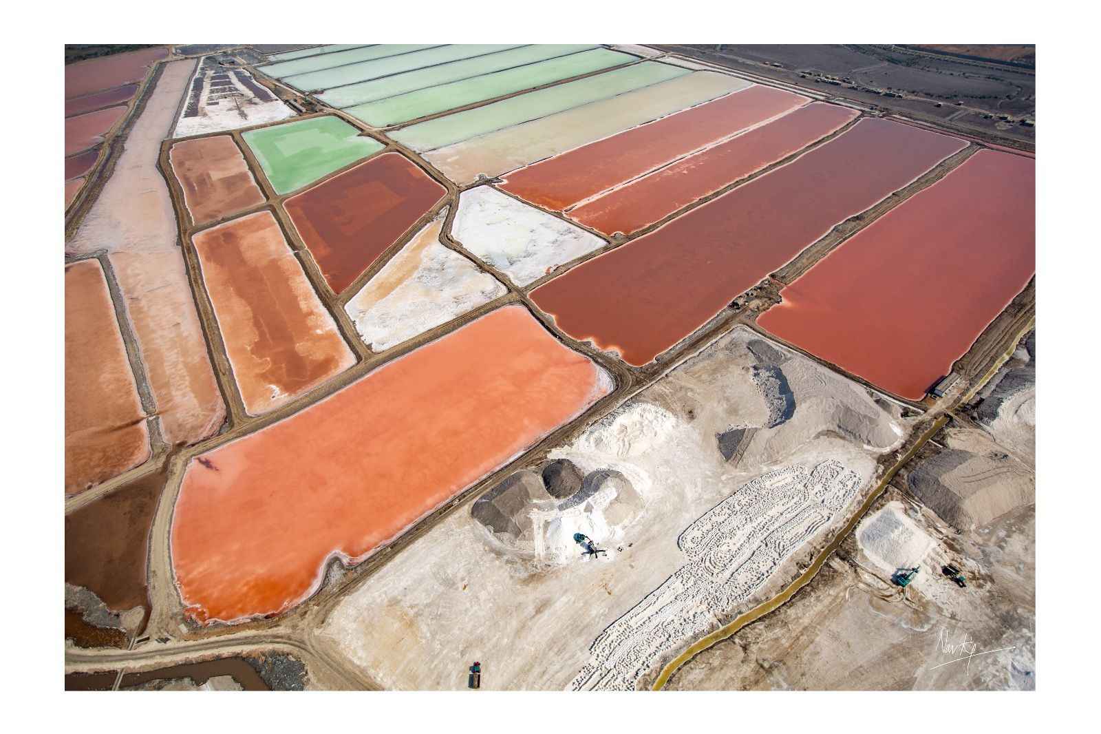 The salt evaporation ponds tend to turn different colours due to the level of salinity