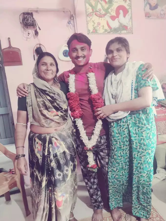 Sunil with his mom and wife