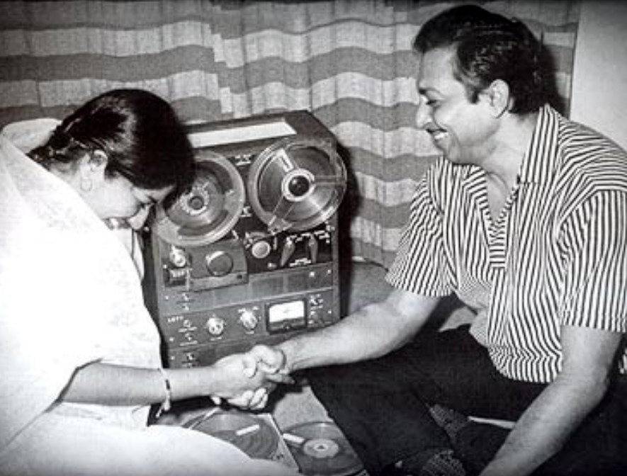 Madan Mohan with Lata Mangeshkar while recording a soundtrack for a film
