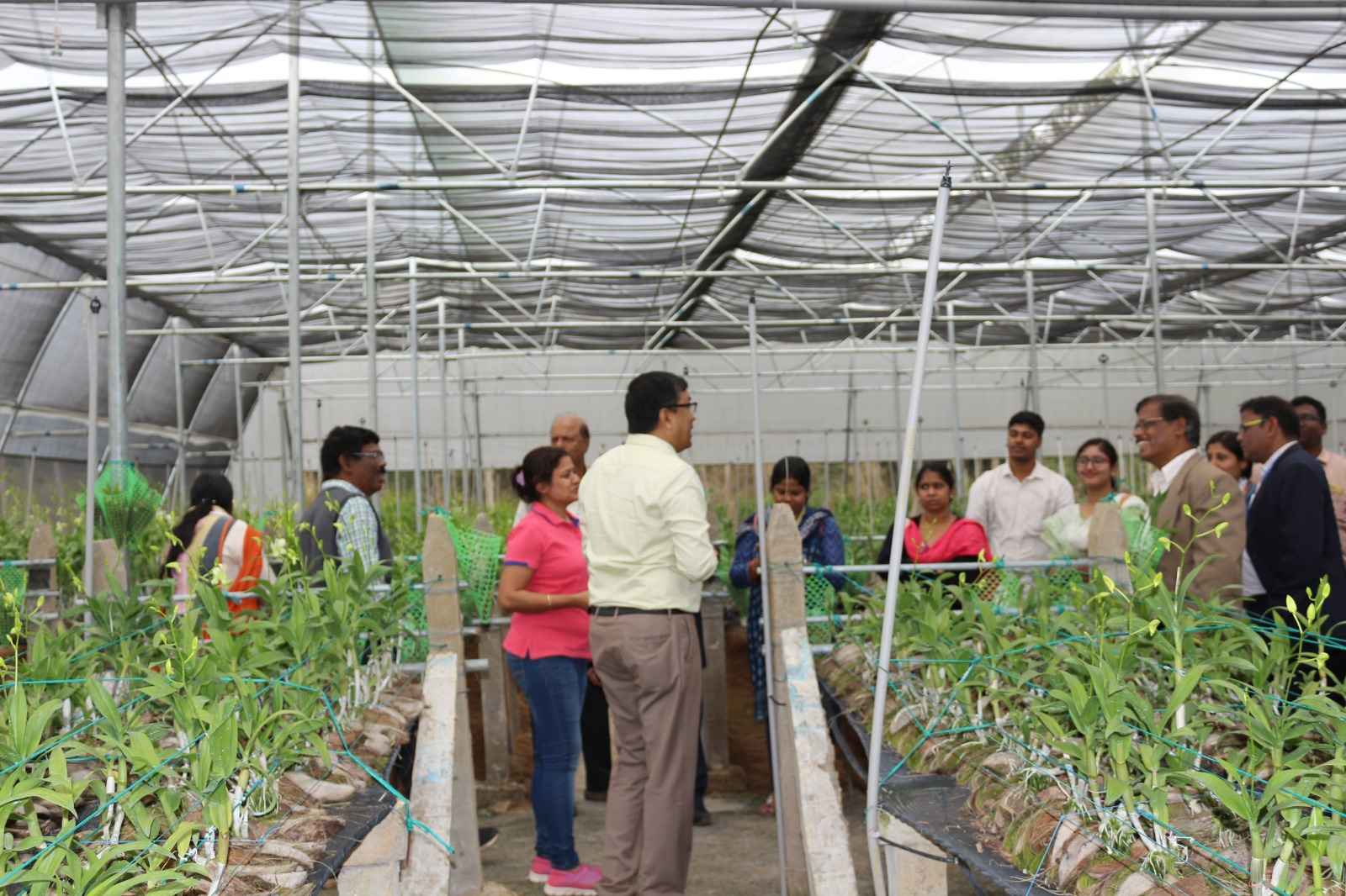 The Mohantys with visitors at their farm.