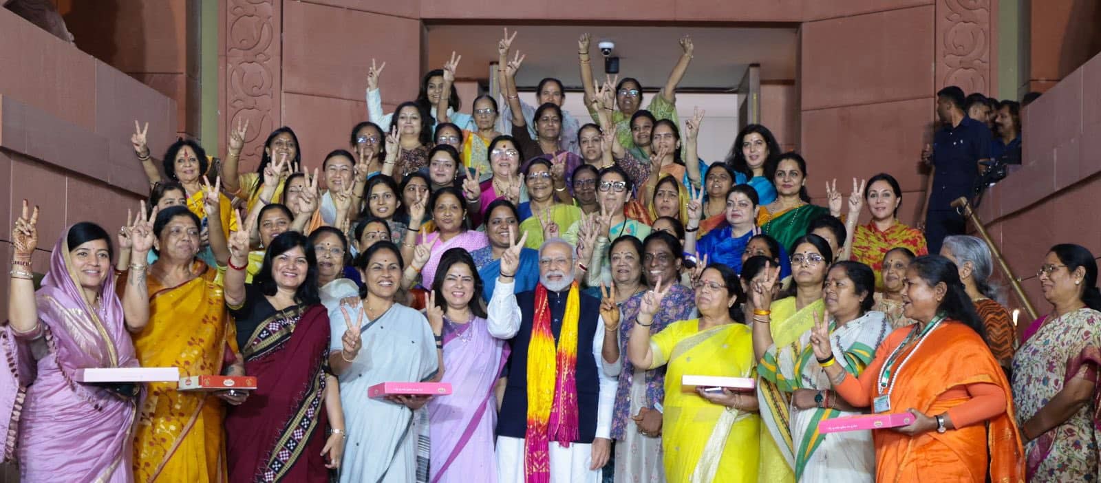 PM with women MPs after the Bill was passed.