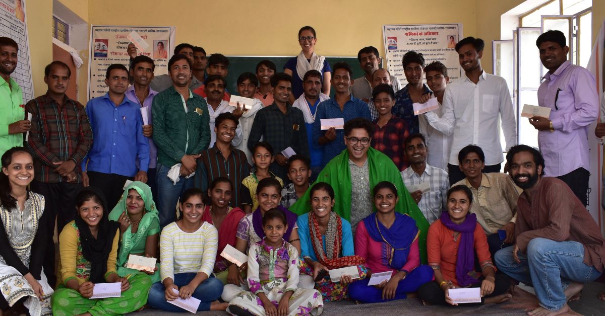 Manu Chopra with his workers from rural India