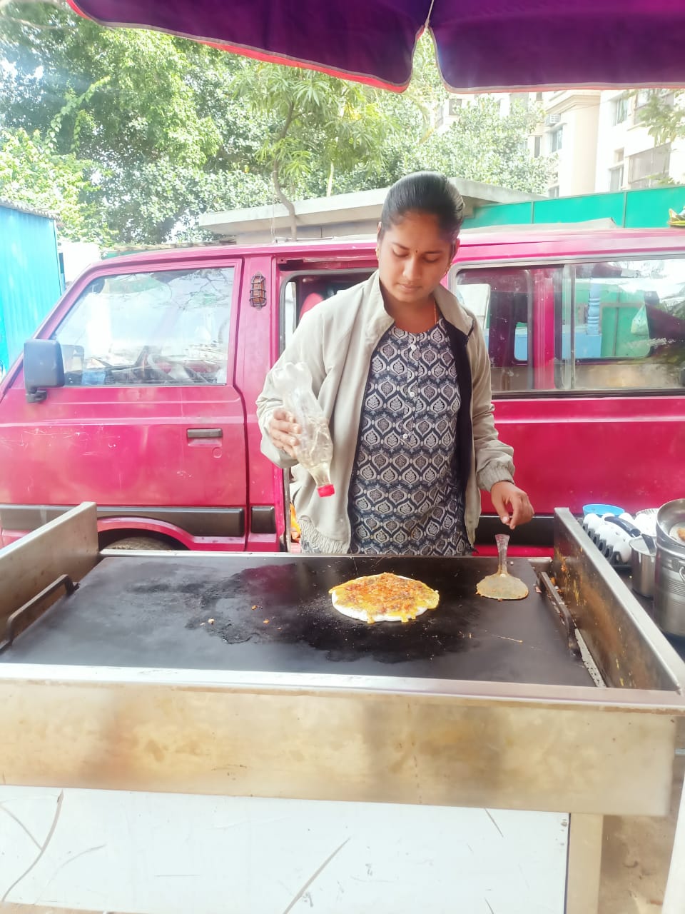 Veena runs 'Kari Dosa', a food cart in JP Nagar, Bengaluru