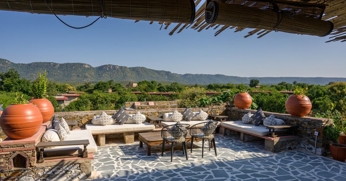 The forest lounge opens up to a majestic view of the Aravali Hills and the deciduous forests