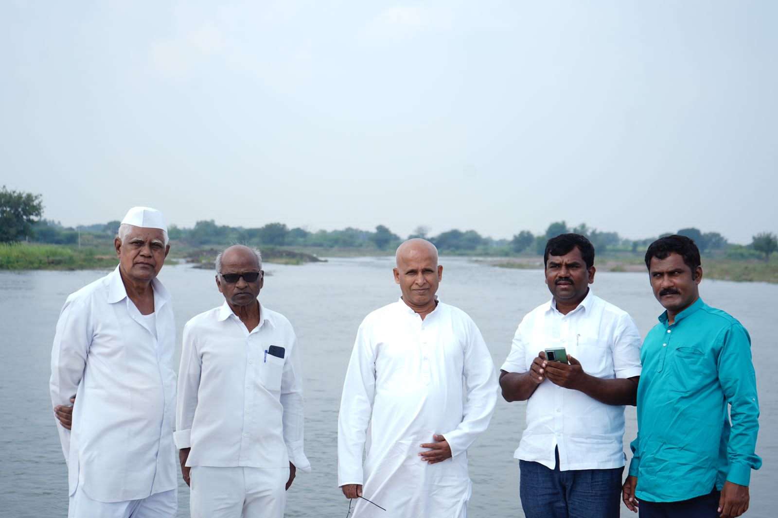 Ghongade (second from left) and some members of the team of experts and locals who helped revive the Manganga river.