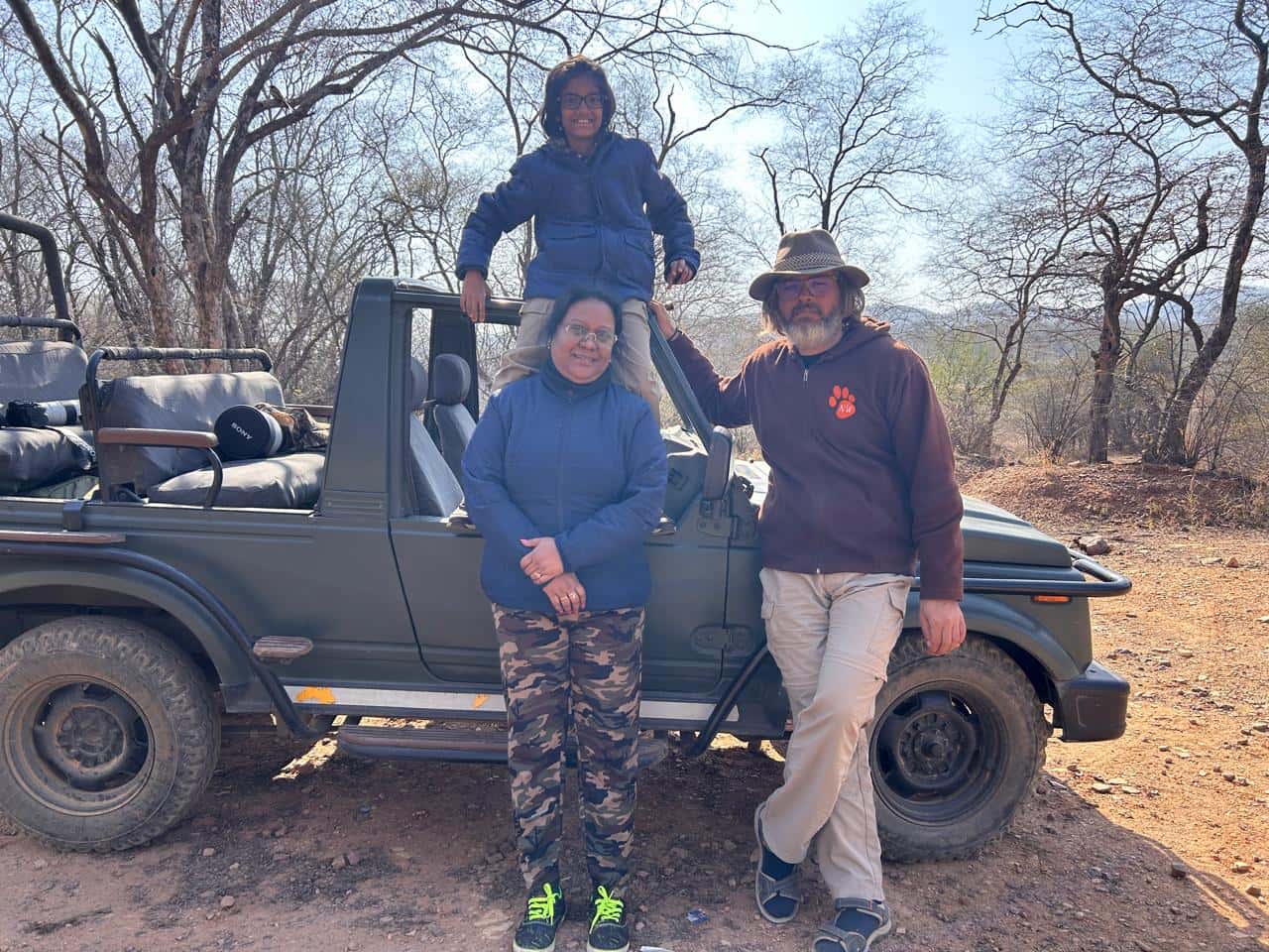 Shreyovi with her parents on a safari.