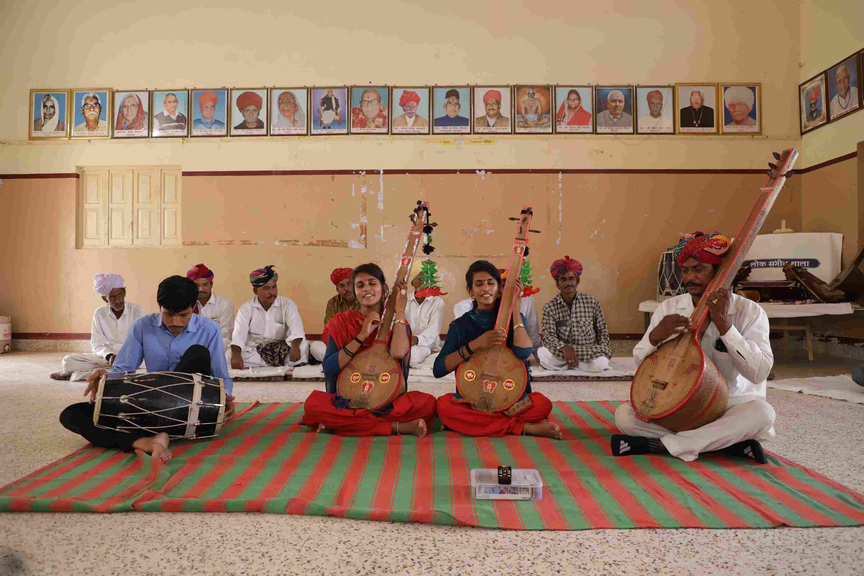 Students from the Langa, Meghwal, and Manganiyar communities learning Rajasthani folk music directly from master artists during the Lok Sangeet Shala residency.