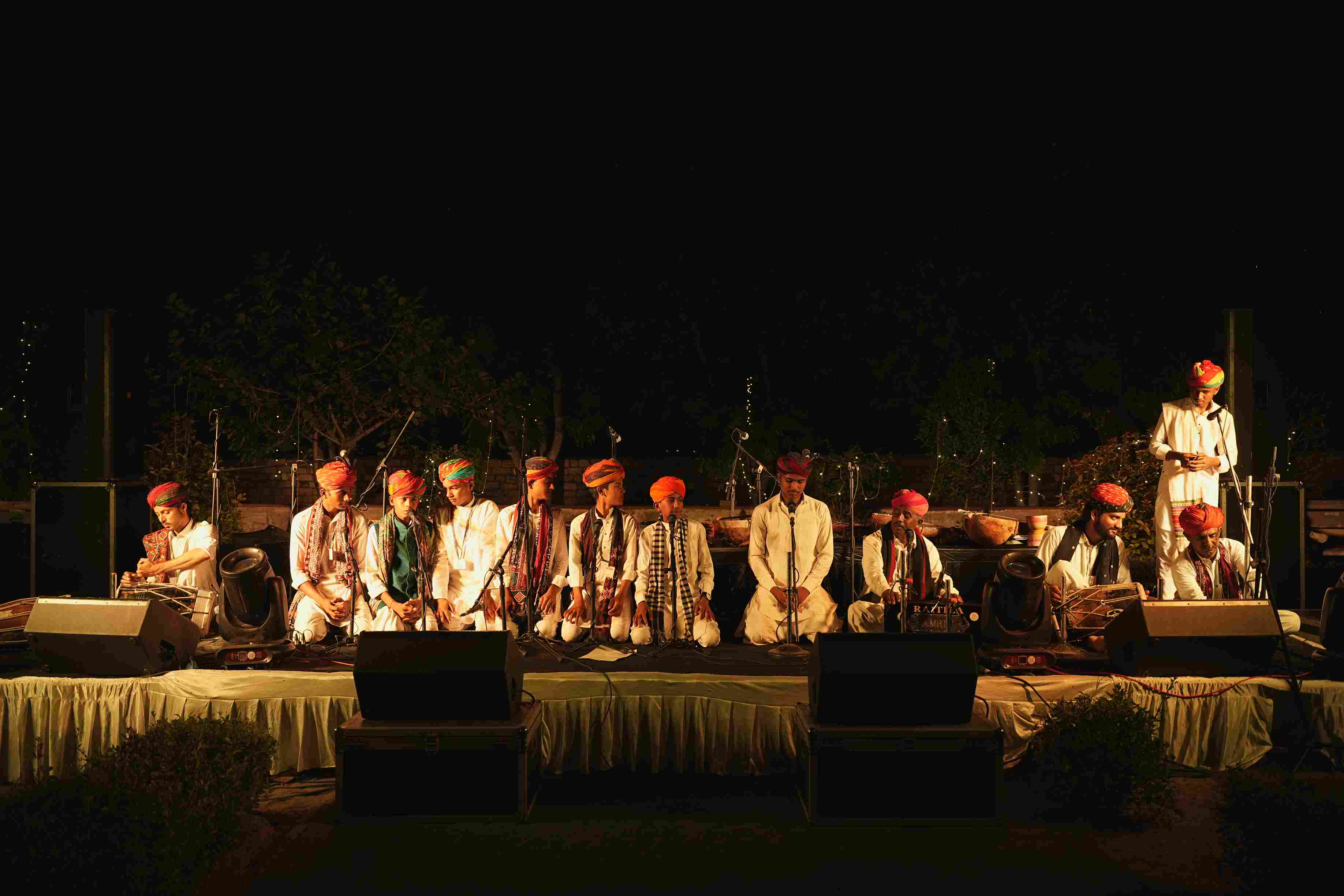 Musicians from Rajasthan’s Langa, Meghwal, and Manganiyar communities unite on stage, sharing the soul of folk music with a captivated audience.