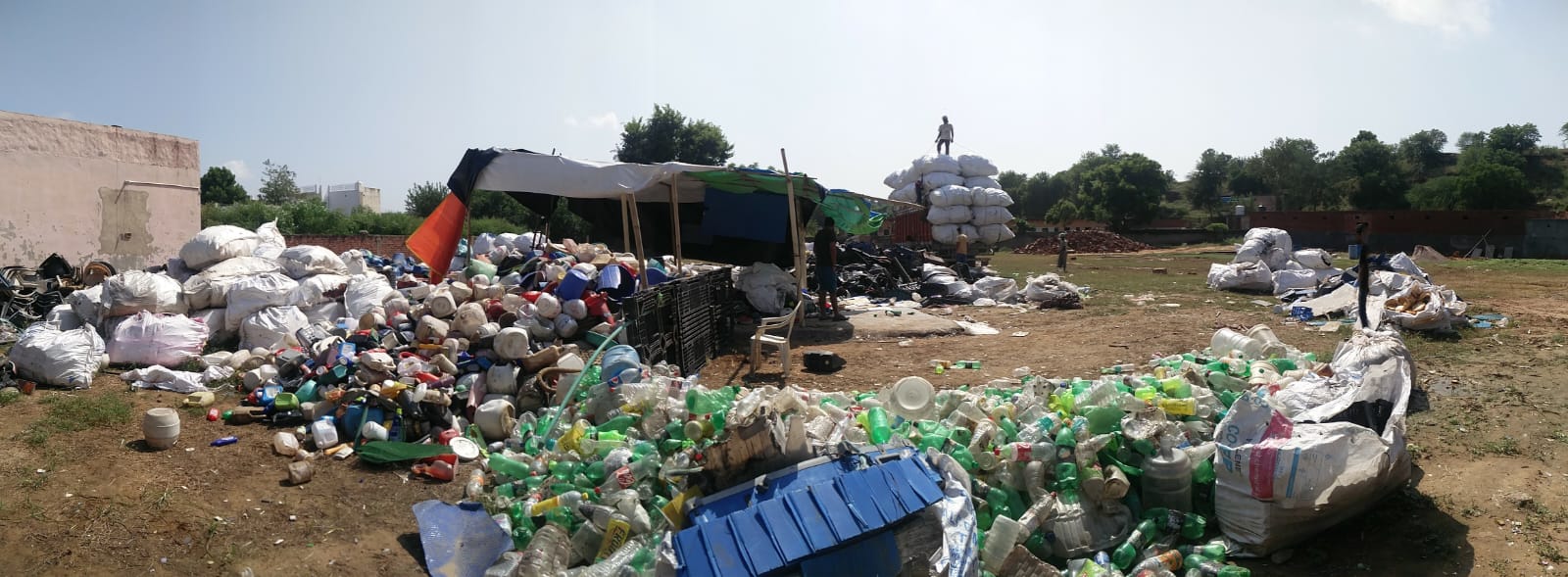 A lot overflowing with plastic waste collected by Dump In Bin.