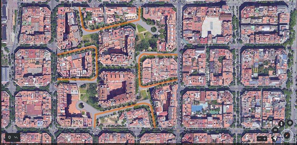 Aerial view of Barcelona showcasing its superblocks, with green spaces and pedestrian-friendly streets within the octagonal city blocks.