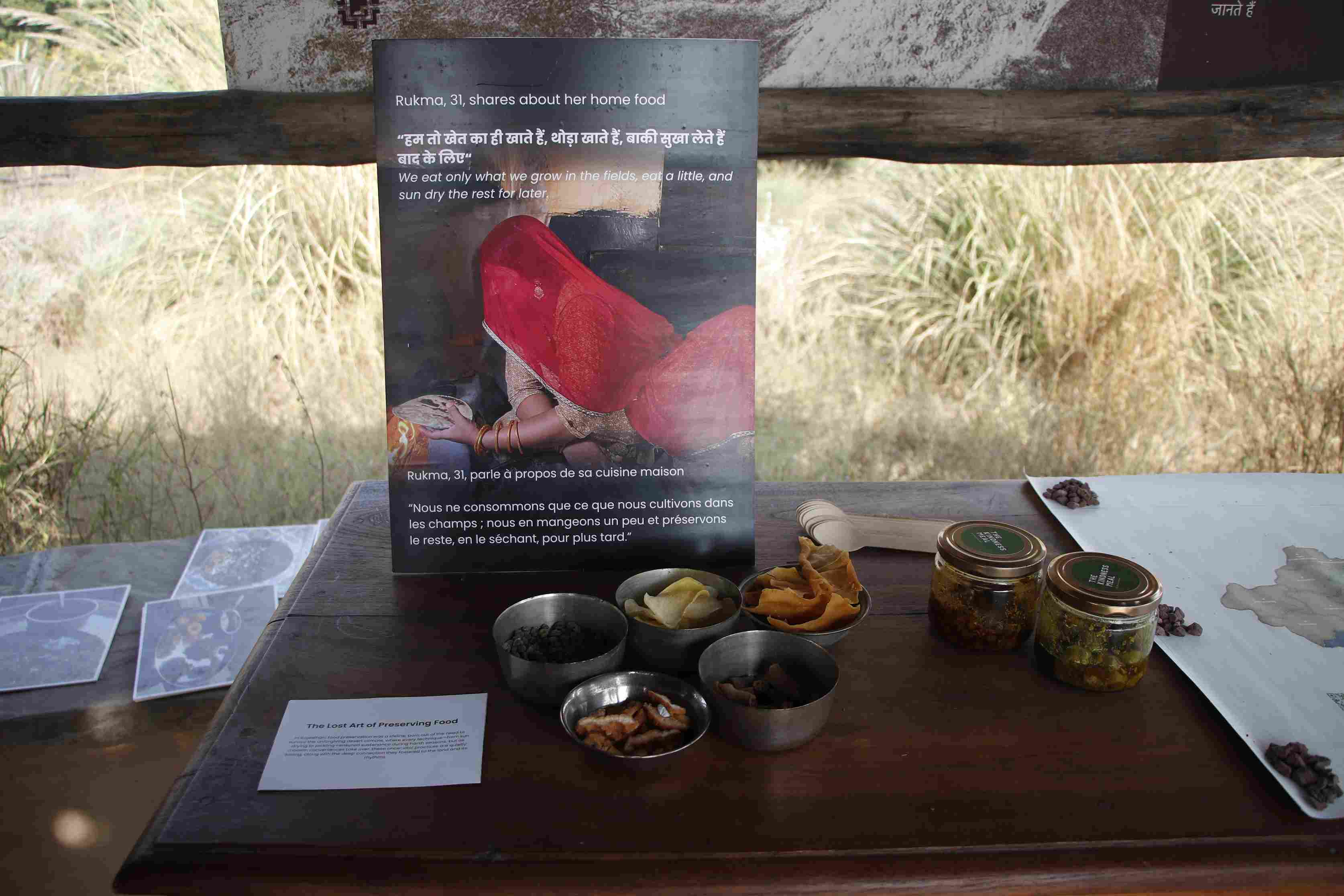 A set up showcasing the home recipes made by a woman named Rukma for the students at the food culture play date. 