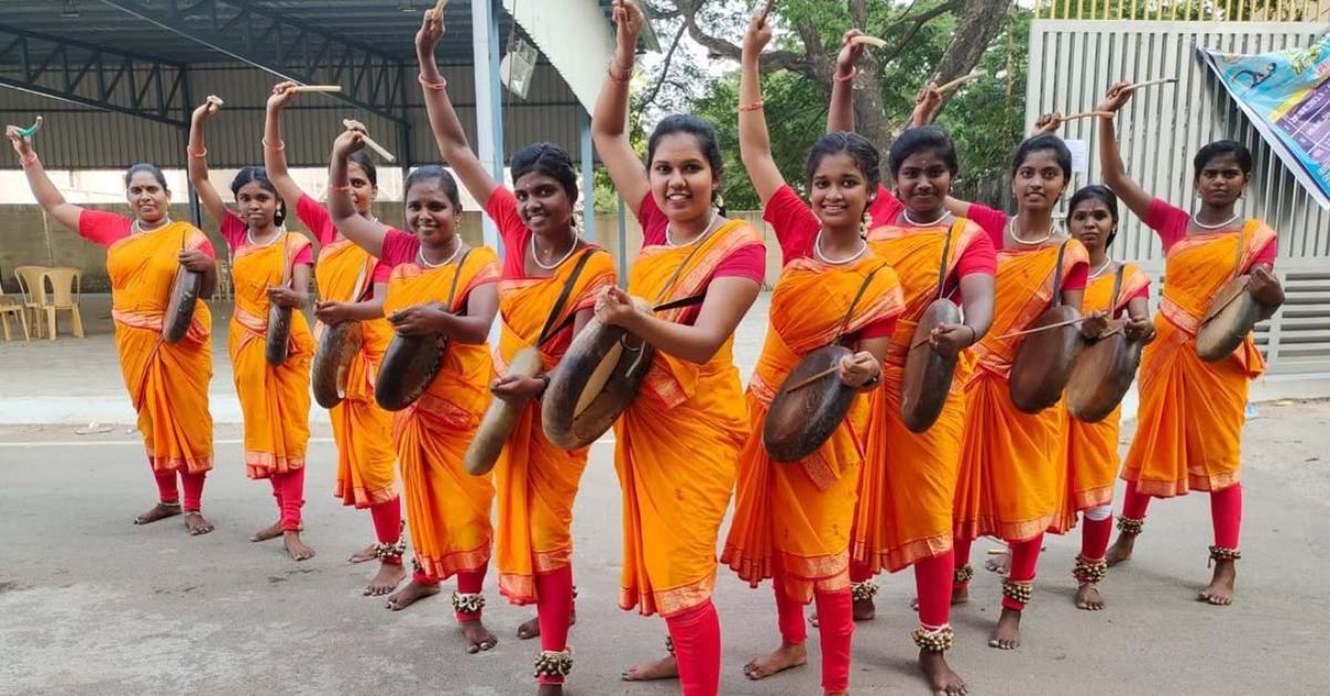 A group of women playing parai