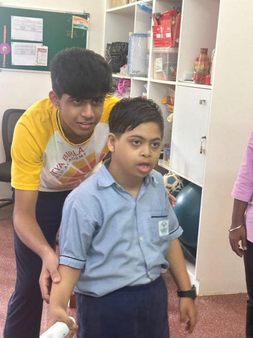 Shaurya Kuldeep, a child with Down syndrome, takes interest in playing the games on the Nintendo Wii