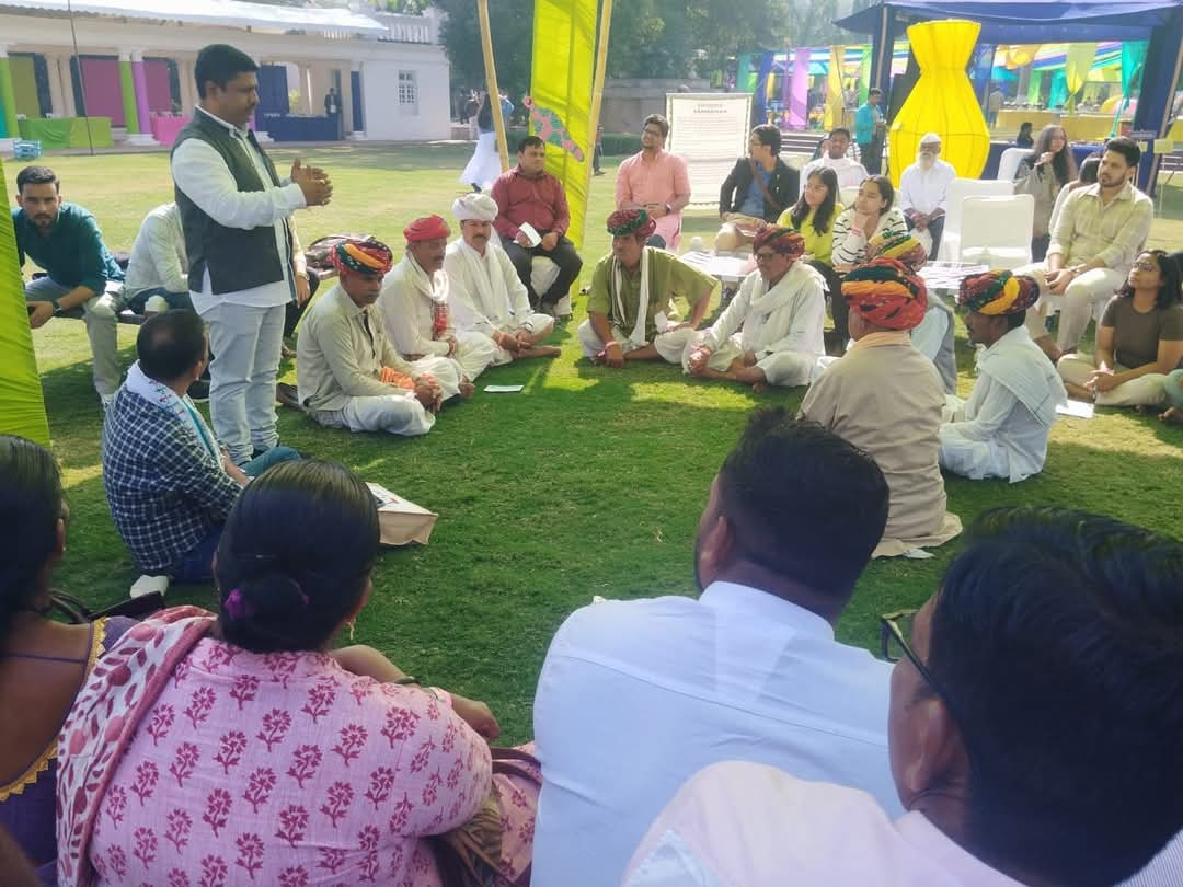 Paras holding a meeting with members of nomadic groups from his community, engaging in a discussion to address their issues and concerns.