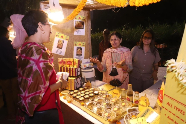 Meenakshi interacts with a customer in her stall 