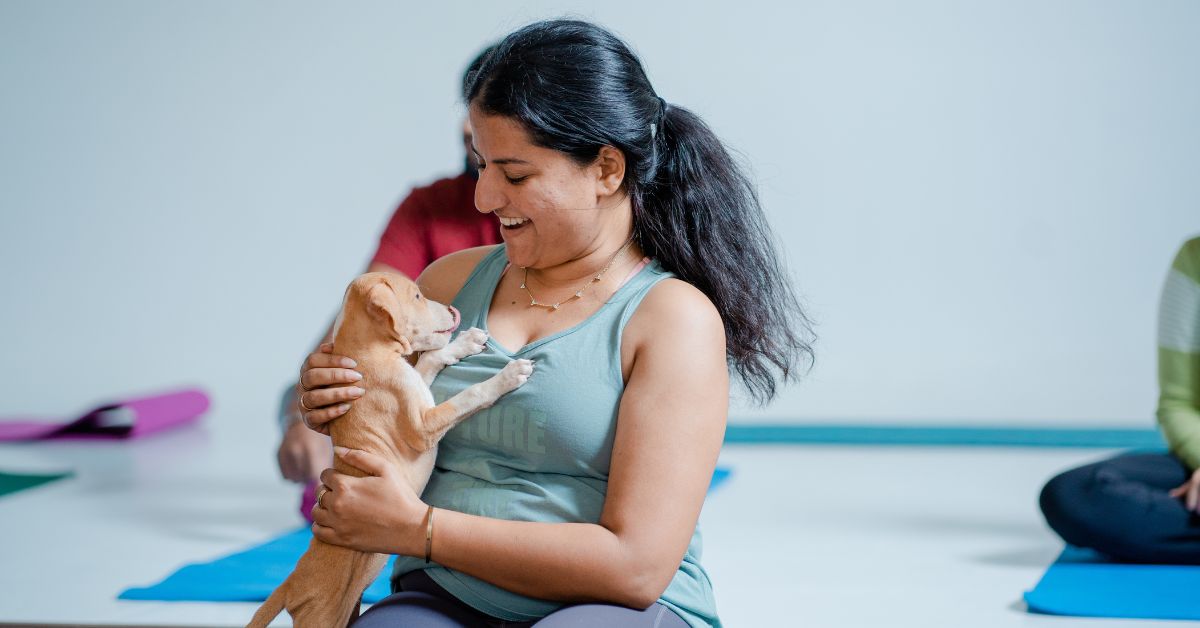 How a Yoga Class With Dogs Is Helping Strays Find Homes