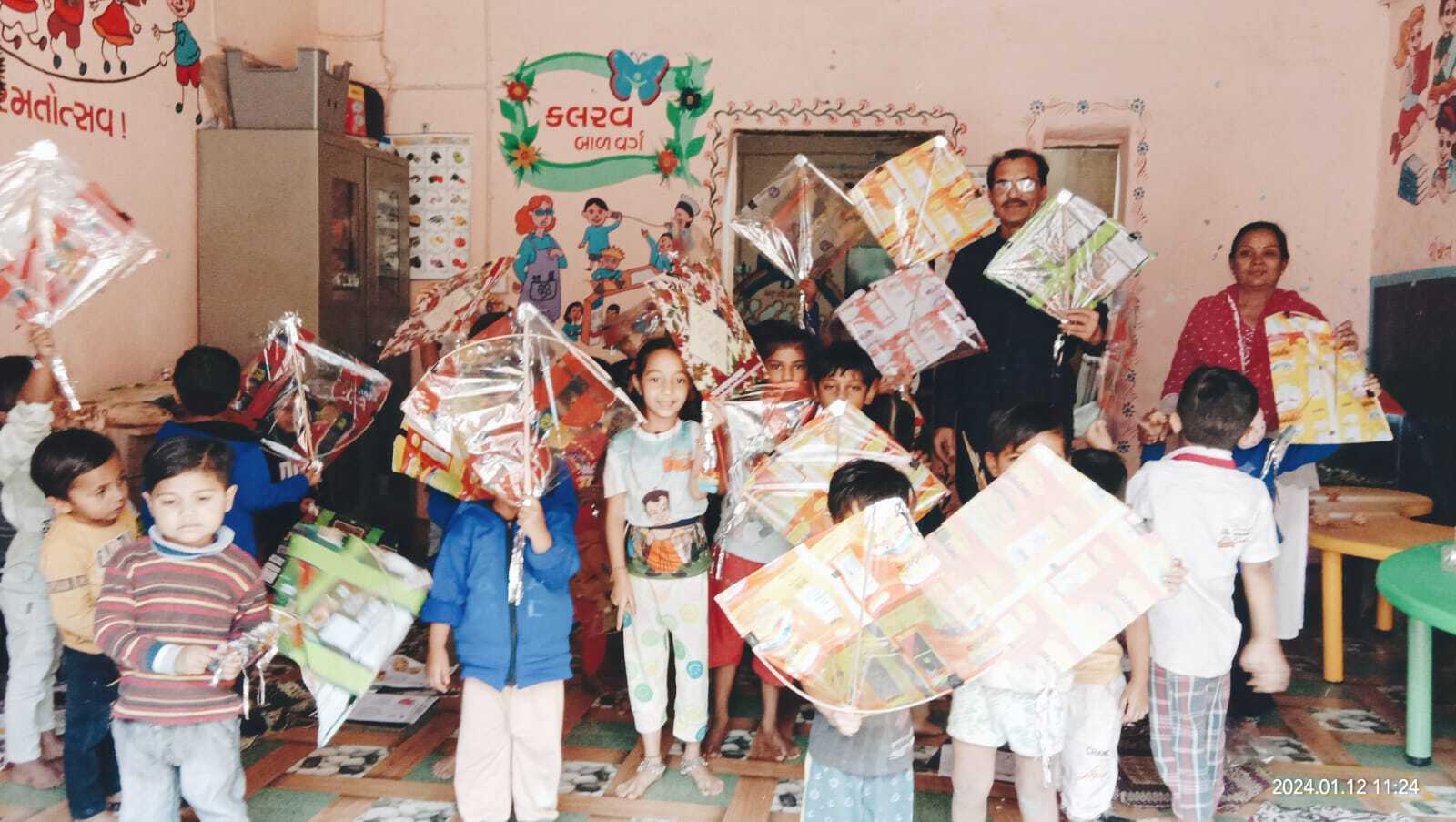 Pankaj distributed kites among children during Makar Sankranti