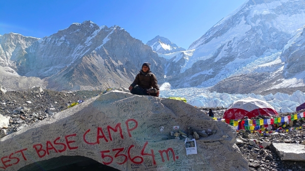 Samya sitting at the Everest Base camp.