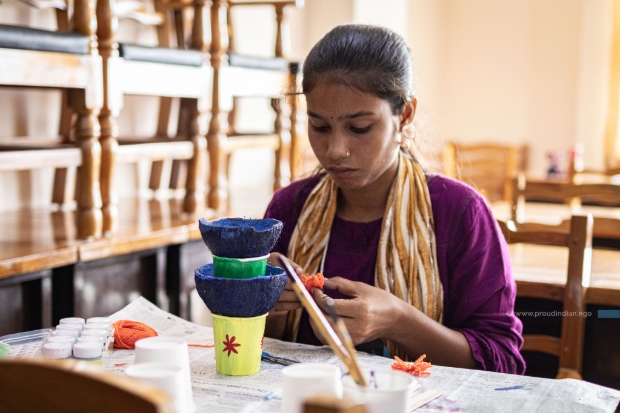 A child painting and doing art work.