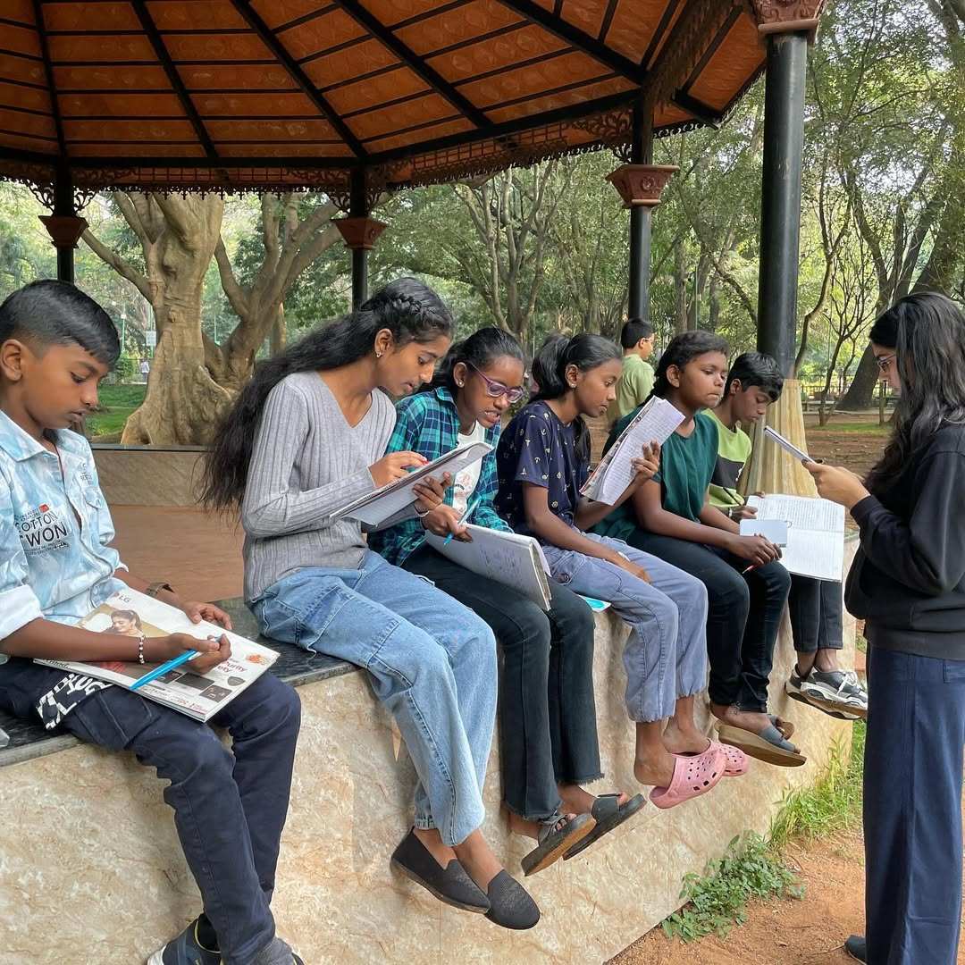 Children writing their stories in Cubbon Park