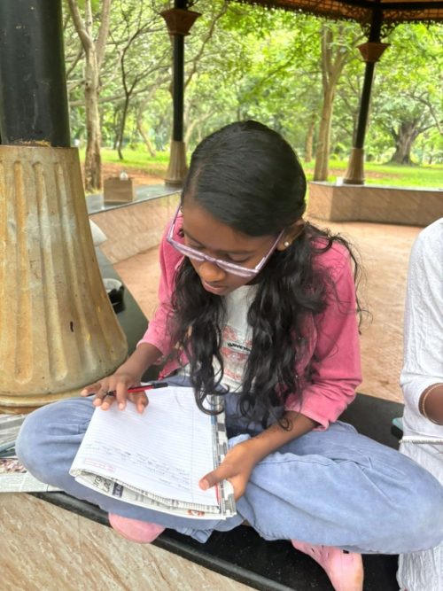 a kid writing her story