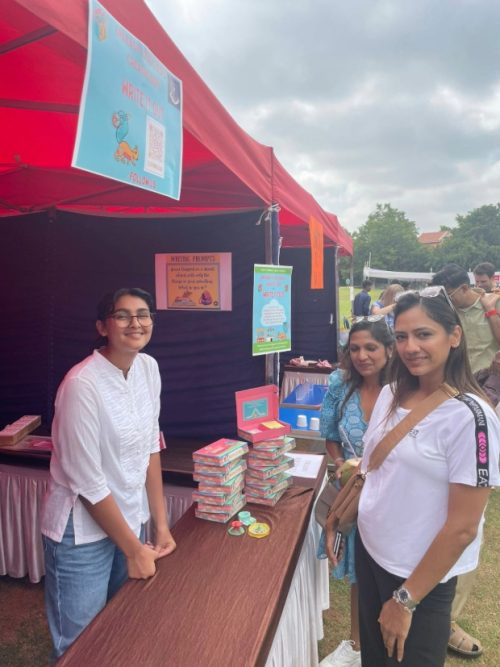 Vidhi in her stall selling CleverBox.