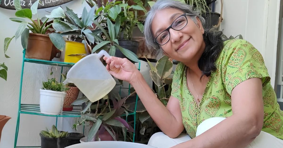 Odette watering her plants