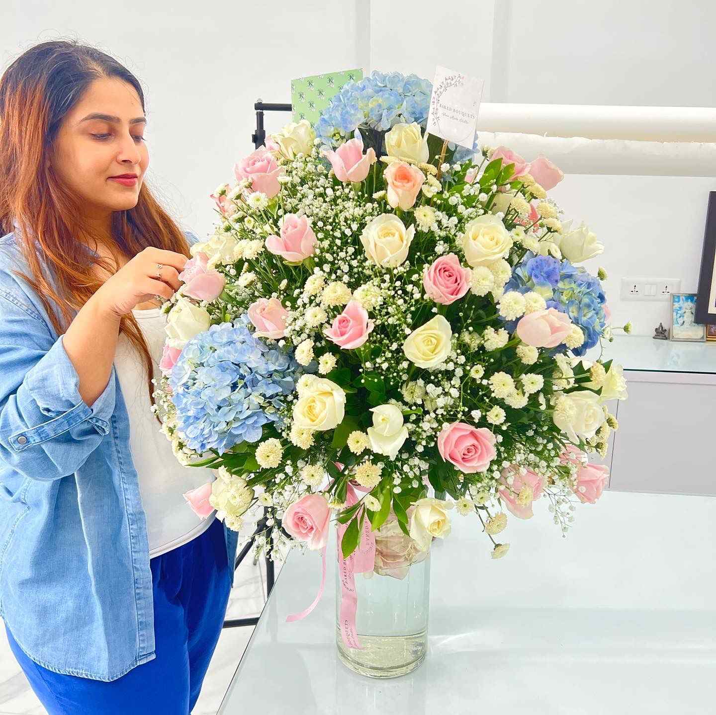 Shreenal handles research, finances, and digital marketing, while Rupal focuses on sourcing fresh flowers