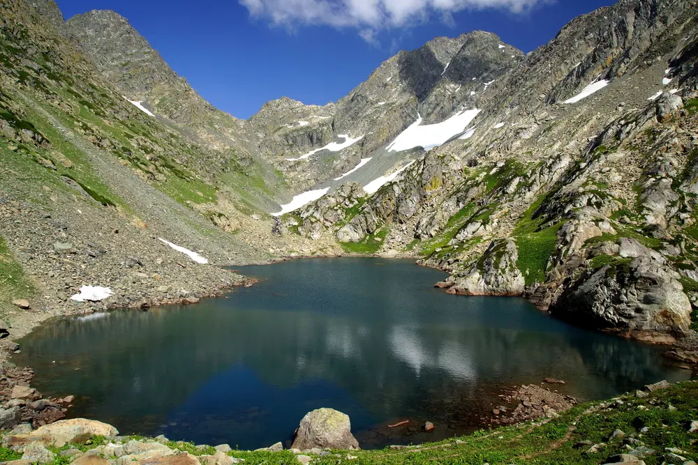 Satsar Lake stretches across seven serene pools, tucked deep in alpine Kashmir.
