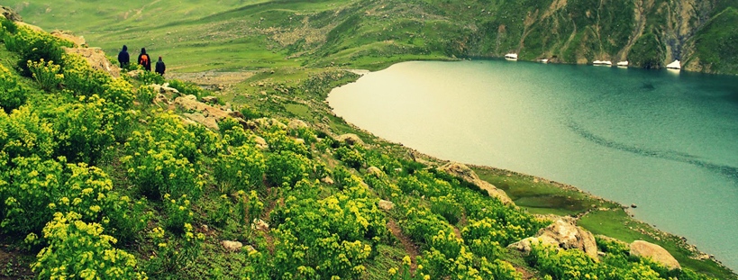 Vishansar Lake mirrors the sky at 12,000 feet — a sacred, glacial jewel where silence flows deeper than the waters.