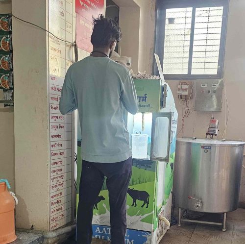 Sunil's milk ATM serves a customer base of 200 to 250 people, many of whom are smart card users. 