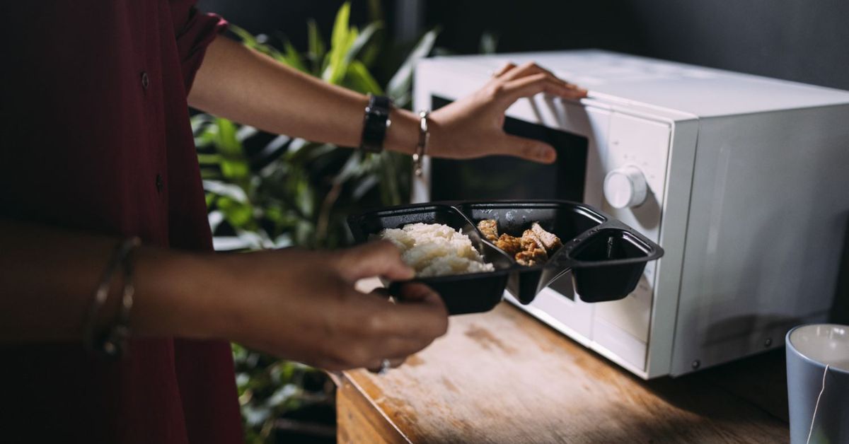 black plastic container into microwave