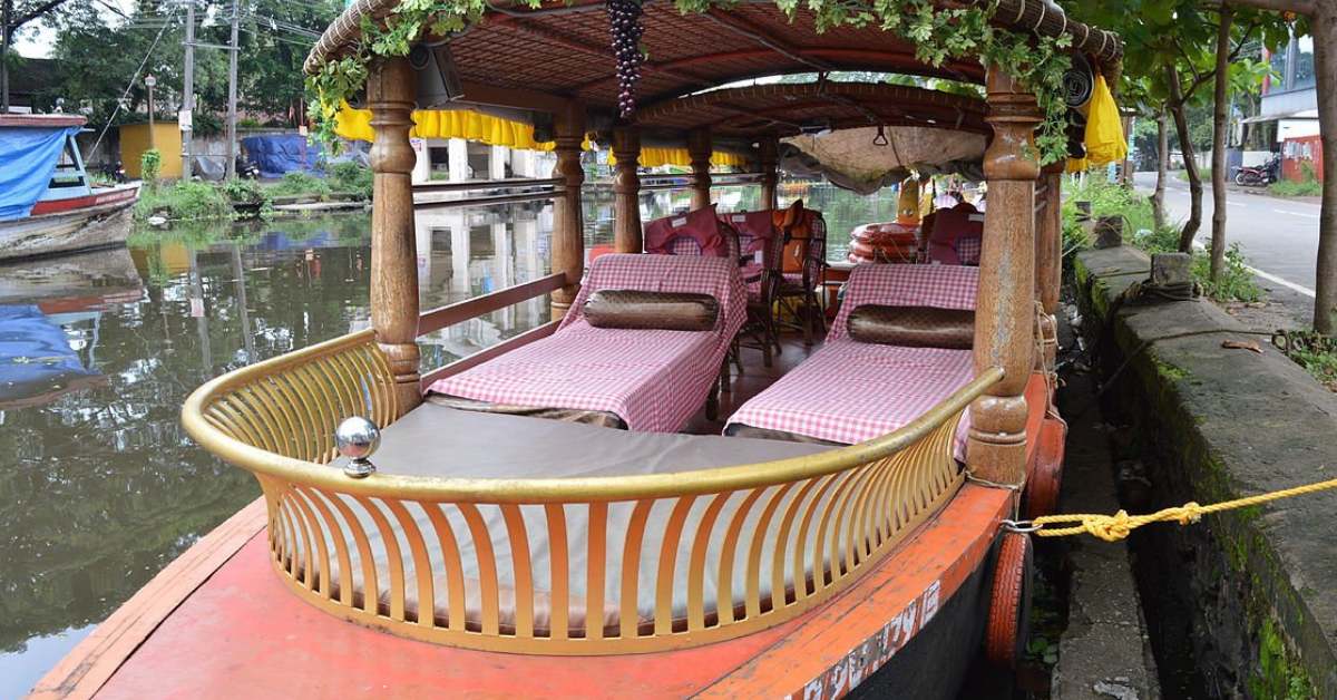 Hop onto a colourful shikara in Alleppey and enjoy different snack items with your family during your picnics; Picture source: Srees Tours