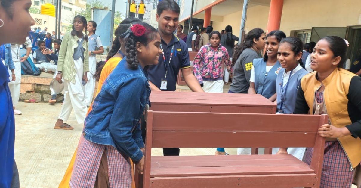 children carrying the benches