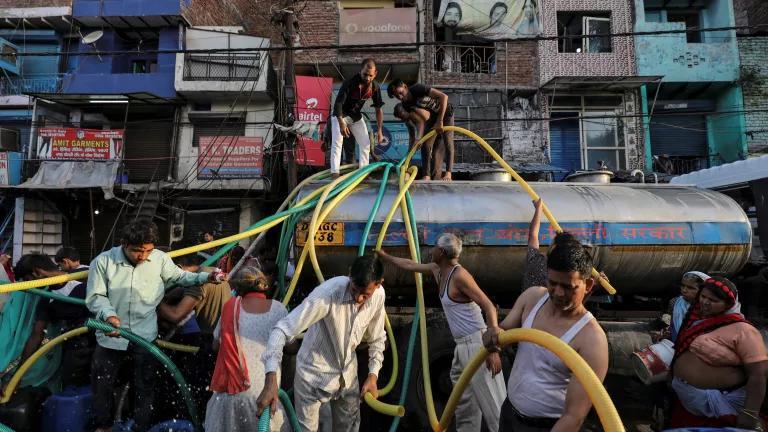 Streets are busy with people using misting systems to beat the heat in crowded cities like Delhi and Gurgaon.