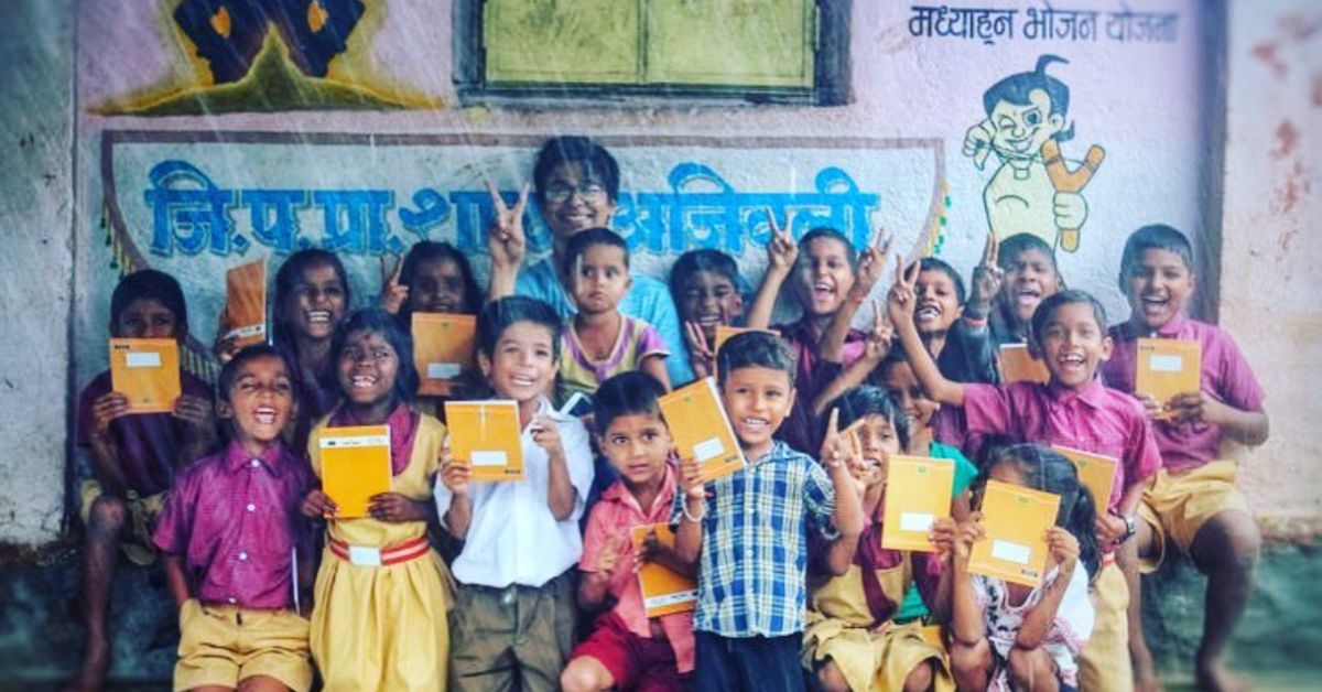 Chetan Pardeshi with the kids of a Zilla Parishad school.