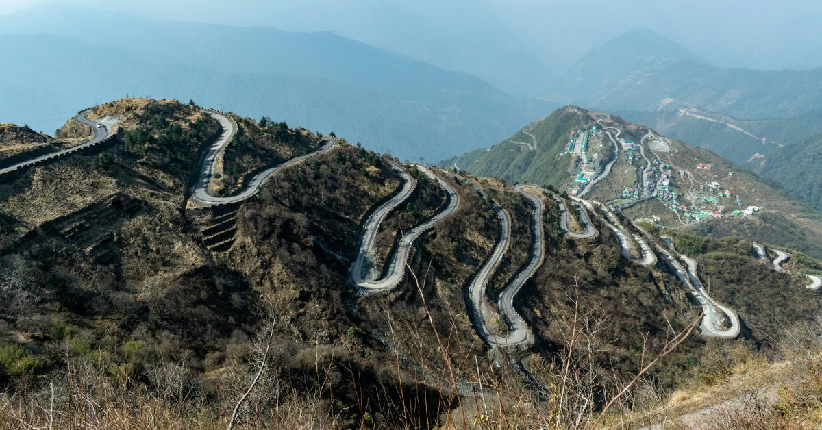 Today, the Old Silk Route offers stunning treks through Zuluk, Nathang Valley, and Gnathang Monastery, with winding hairpin bends and panoramic views of Kanchenjunga. 
