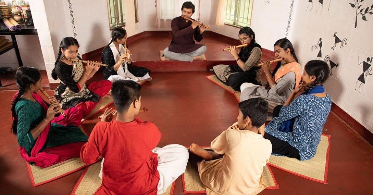 Music classes nurture rhythm and joy in the kids.
