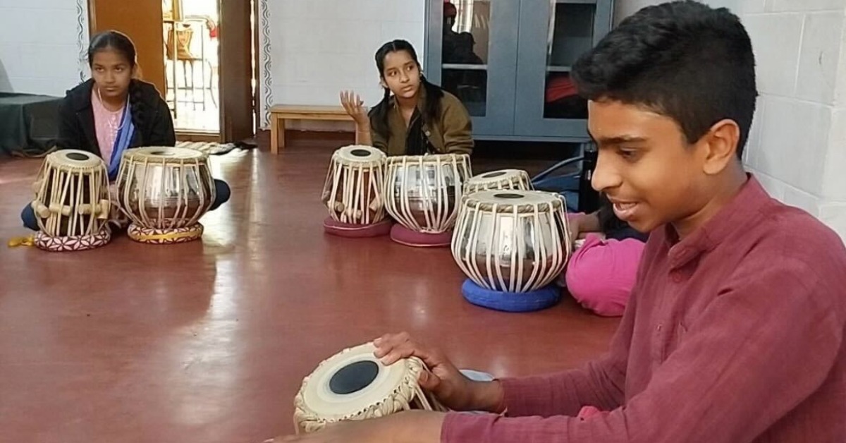 Morning music practice on the tabla fills the campus with rhythm before formal lessons begin.